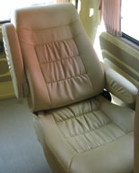 reclining seats with wheelchair storage behind